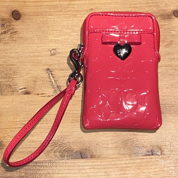 Coach Handbags - Coach patent leather cellphone cigarette wristlet heart with bow